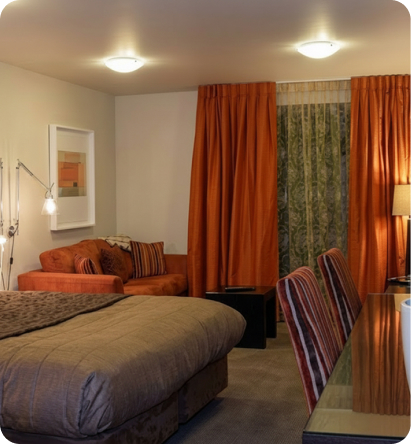 Bright apartment interior at Terra Vive with seating and modern decor.